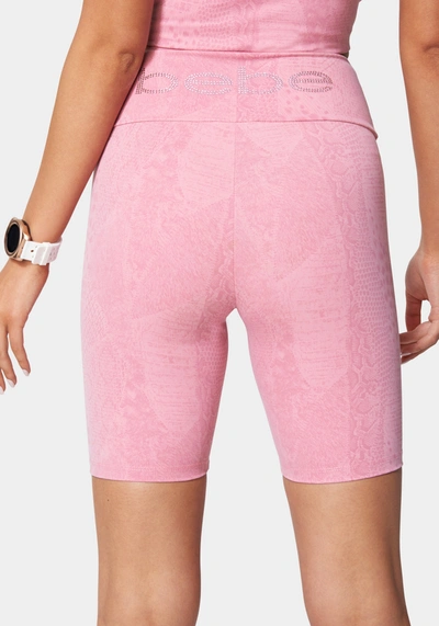 Bebe Logo Embossed Snakeskin Biker Short In Embossed Orchid