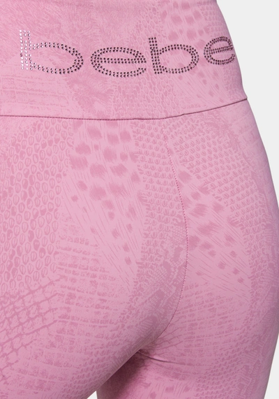 Bebe Logo Embossed Snakeskin Legging In Embossed Orchid