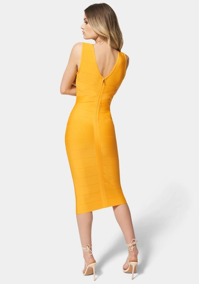 Shop Bebe Bandage Midi Dress In Amber Yellow