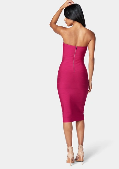 Bebe Bandage Lace-up Strapless Dress In Fuchsia Red