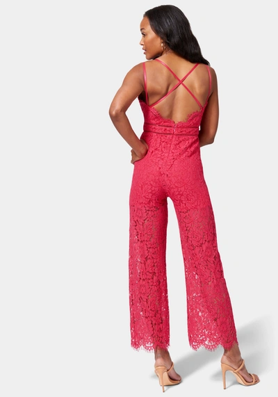 Bebe Strappy Back Lace Jumpsuit In Fucshsia Red