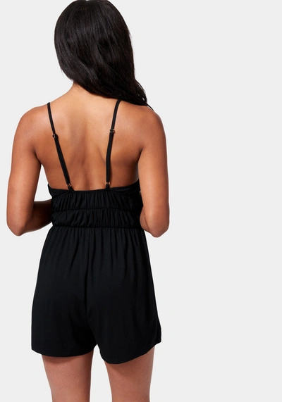 Bebe Tiered Waist Tie Front Romper In Black