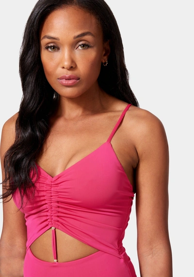 Shop Bebe Front Keyhole Ruched Knit Bodysuit In Bright Rose