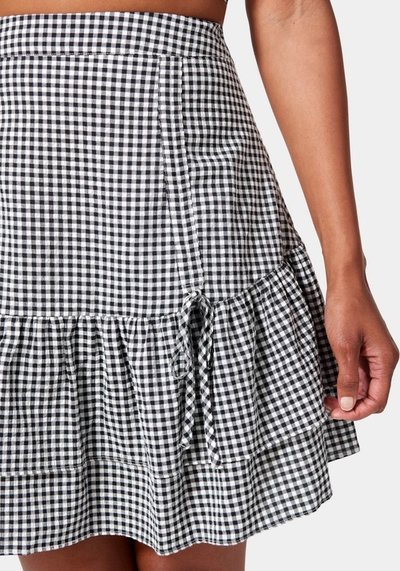 Bebe Mini Gingham Front Ruching Flutter Skirt In Black,white Alyssum