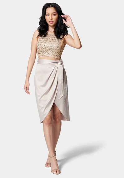 Shop Bebe Side Tie Wrap Skirt In Champagne