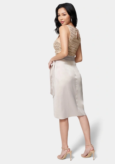 Shop Bebe Side Tie Wrap Skirt In Champagne