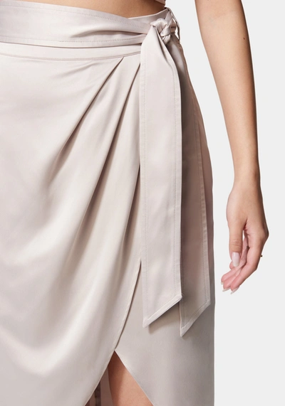 Shop Bebe Side Tie Wrap Skirt In Champagne