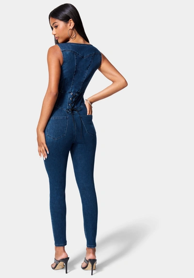 Shop Bebe Skinny Leg Front Zip Denim Jumpsuit In Medium Indigo Wash