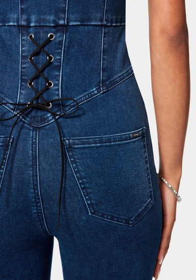 Bebe Skinny Leg Front Zip Denim Jumpsuit In Medium Indigo Wash