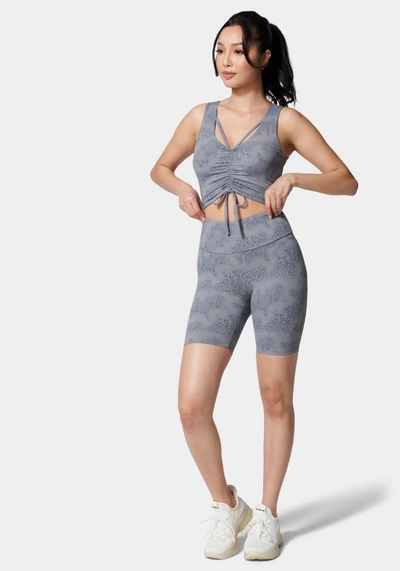 Bebe Logo Foiled Print Ruched Front Knit Top In Steel Blue Animal Print