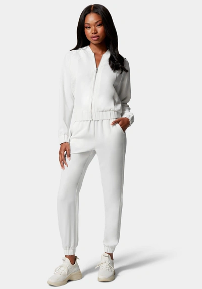 Shop Bebe Lux Lounge Crepe Jogger With Combo Satin In White Alyssum