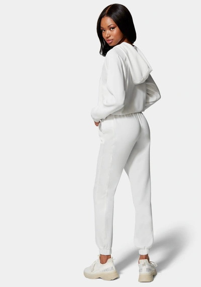 Shop Bebe Lux Lounge Crepe Jogger With Combo Satin In White Alyssum