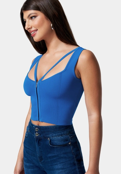 Shop Bebe Zip Front Corset Sweater Top In Diva Blue