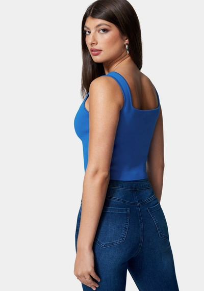 Shop Bebe Zip Front Corset Sweater Top In Diva Blue