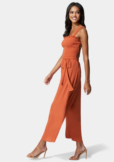 Shop Bebe Caged Back Culotte Jumpsuit In Hawaiian Sunset