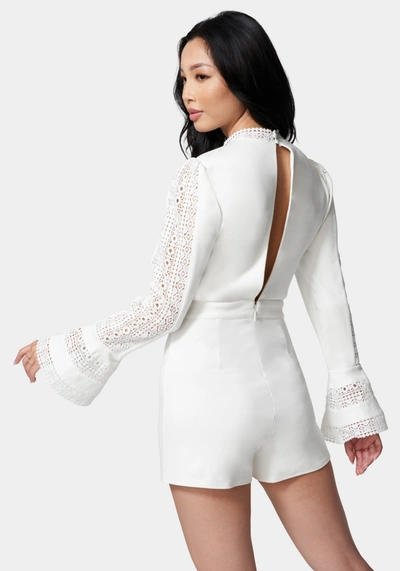 Bebe Ruffle Bell Sleeve Romper In Ivory