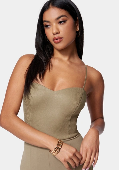 Shop Bebe Vegan Leather Open Leg Jumpsuit In Taupe,taupe