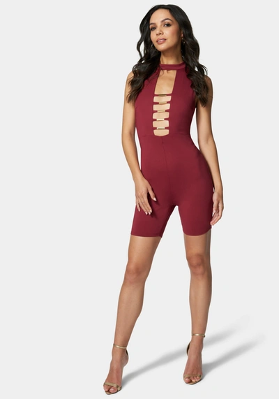 Shop Bebe Caged Biker Short Romper In Marsala