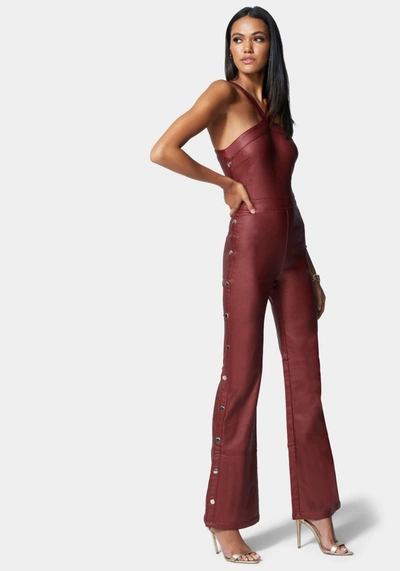 Bebe Wide Leg Snap Detail Coated Denim Jumpsuit In Bloodstone