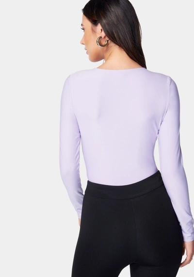 Shop Bebe Ring Detail Long Sleeve Bodysuit In Lavender