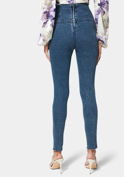 Shop Bebe High Waisted Button Detail Skinny Jeans In Antique Indigo Wash
