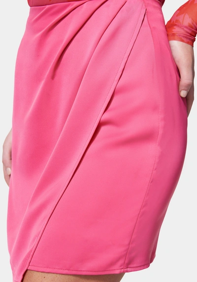 Shop Bebe Satin Wrap Skirt In Fuchsia