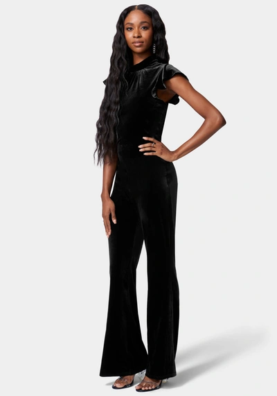 Bebe Ruffle Sleeve Flare Leg Velvet Jumpsuit In Jet Black