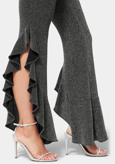 Shop Bebe Glitter Knit Ruffle Leg Jumpsuit In Gunmetal