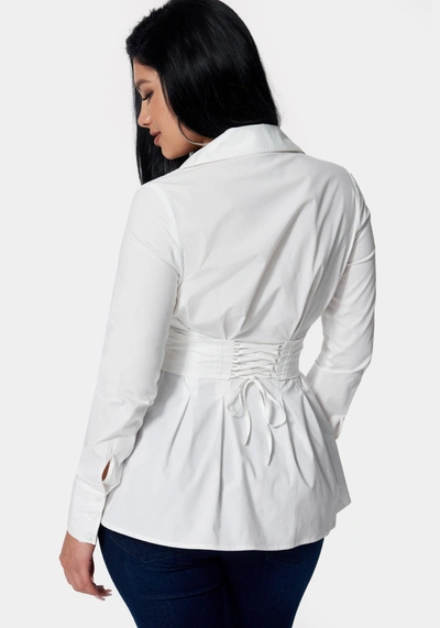 Shop Bebe Poplin Corset Detail Long Sleeve Blouse In White Alyssum