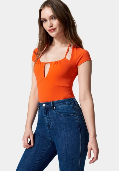Bebe Short Sleeve Tie Ruched Neck Knit Top In Cherry Tomato