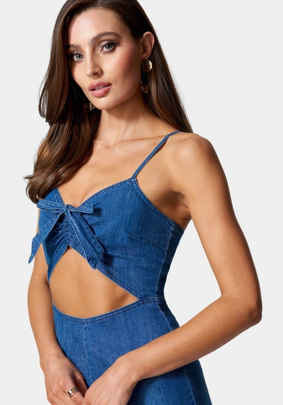 Shop Bebe Front Ruched Cut Out Wide Leg Lightweight Denim Jumpsuit In Medium Blue Wash
