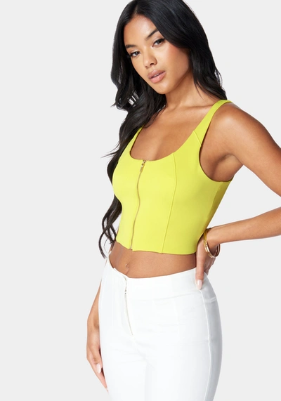 Bebe Sleeveless Front Zip Bustier Knit Top In Cyber Lime