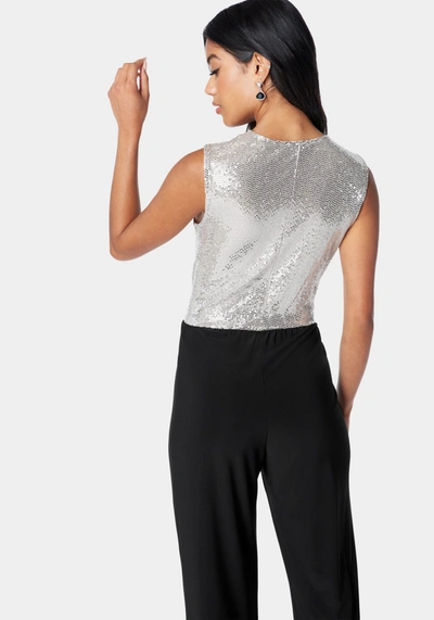 Bebe Disco Dot Wrap Tie Jumpsuit In Silver,black