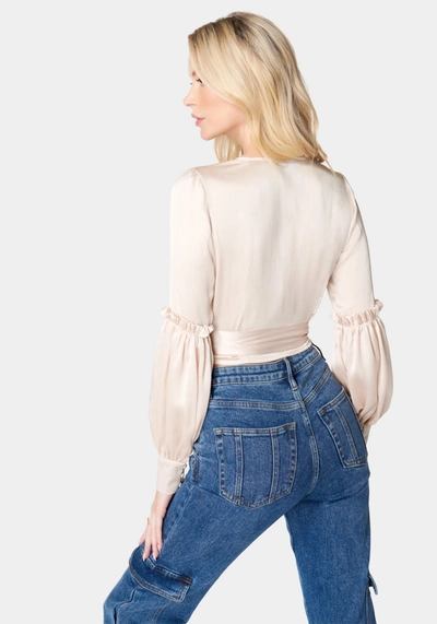 Bebe Balloon Sleeve Wrap Blouse In Peach Whip