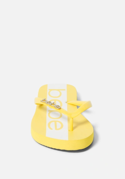 Shop Bebe Tierla  Logo Flip Flops In Yellow