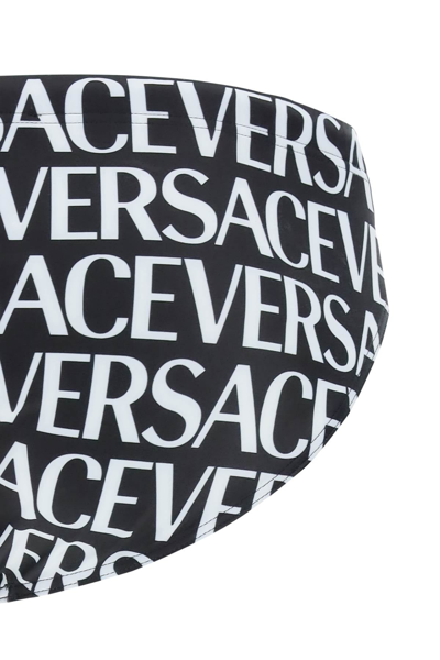 Shop Versace Allover Swim Briefs Men In Multicolor