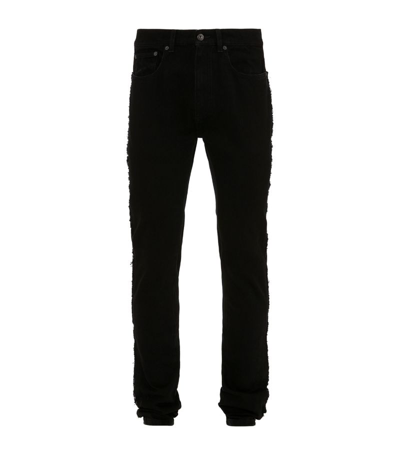 Shop Jw Anderson Cotton Twisted Slim Jeans In Black