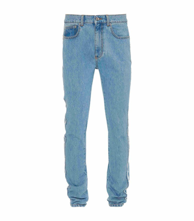 Shop Jw Anderson Twisted Slim Jeans In Blue