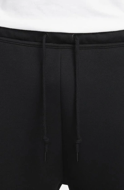 Shop Nike Tech Fleece Open Hem Pants In Black/ Black