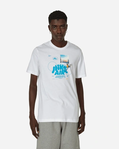 Shop Nike Graphic T-shirt In White