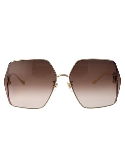 Shop Gucci Sunglasses In 002 Gold Ivory Brown