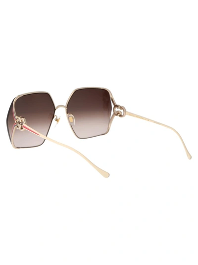 Shop Gucci Sunglasses In 002 Gold Ivory Brown