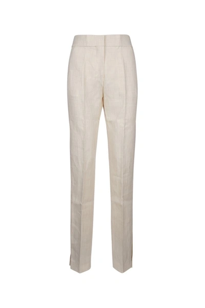 Shop Jacquemus Pants In Offwhite