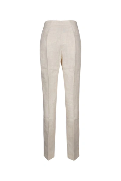 Shop Jacquemus Pants In Offwhite