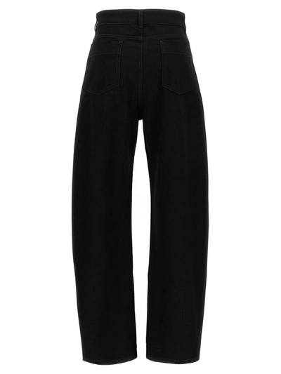 Shop Lemaire 'curved' Jeans In Black