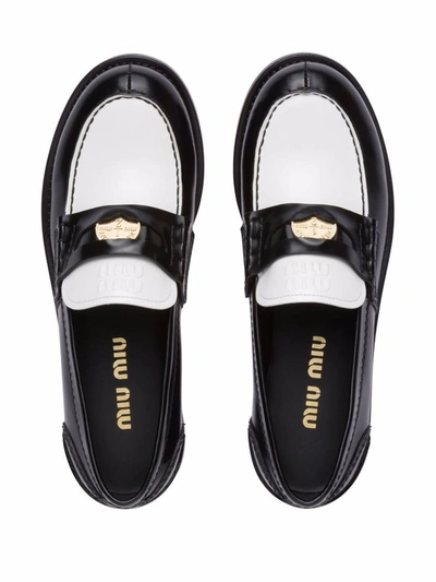 Shop Miu Miu Leather Penny Loafers In Nero+bianco