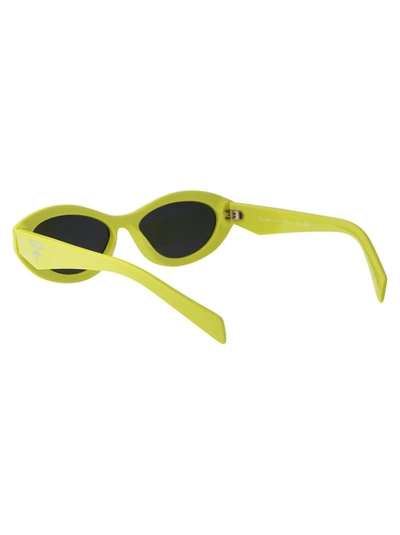 Shop Prada Sunglasses In 13l08z Cedar/black