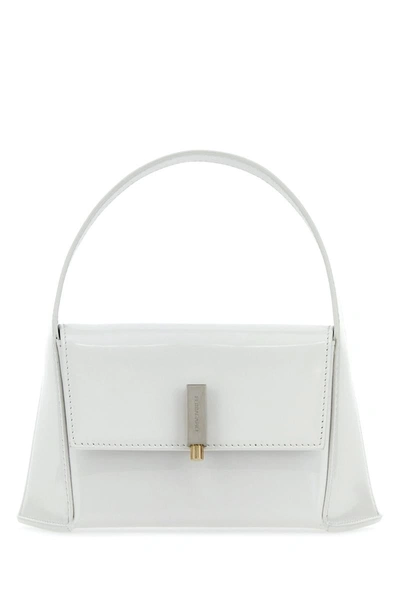 Shop Ferragamo Salvatore  Handbags. In White