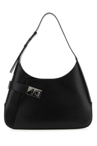 Shop Ferragamo Salvatore  Handbags. In Black