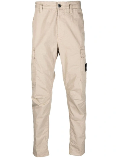 Shop Stone Island Tapered-leg Cargo Trousers In Beige